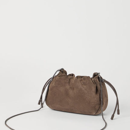Brunello Cucinelli Mellow mini bucket bag in suede with precious chain