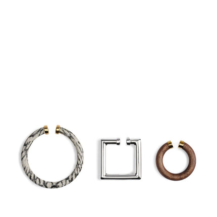 Jacquemus Trio of geometric ear-cuffs.