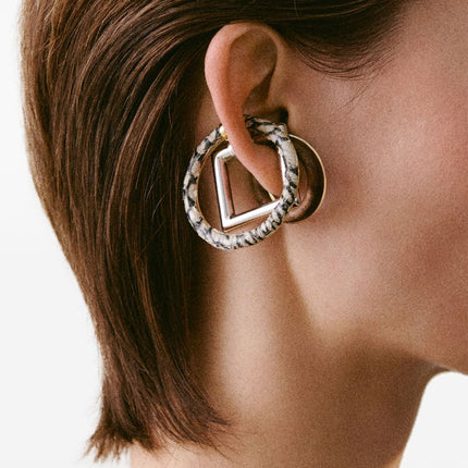 Jacquemus Trio of geometric ear-cuffs.